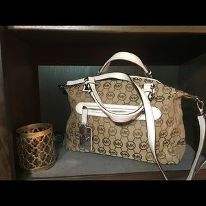 Michael Kors medium size hand bag 12 in x 10 in